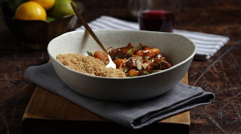 Lamb tagine with apricots, spiced with saffron, coriander, cumin, ginger and cinnamon. (E. Jason Wambsgans/Chicago Tribune/TNS)