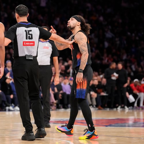New York Knicks guard Jose Alvarado, right, argues with Atlanta Hawks guard CJ McCollum (3) during the second half in Game 2 of a first-round NBA playoffs basketball series, Monday, April 20, 2026, in New York. (AP Photo/Yuki Iwamura)