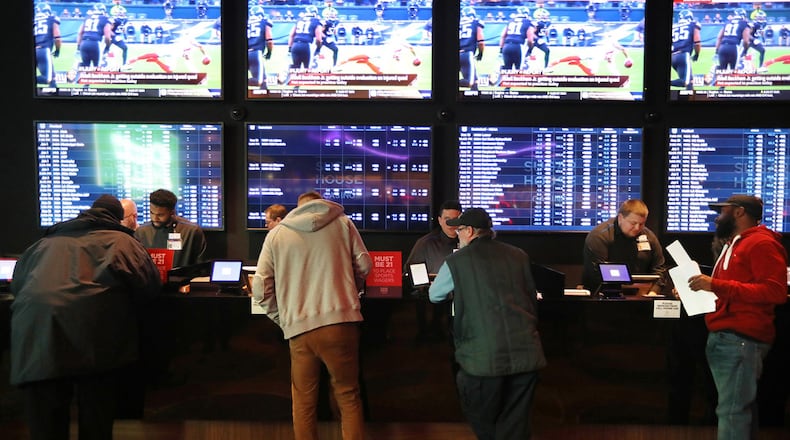 Bettors at the sportsbook at SugarHouse Casino in Philadelphia on launch day, December 13, 2018. (David Swanson/Philadelphia Inquirer/TNS)