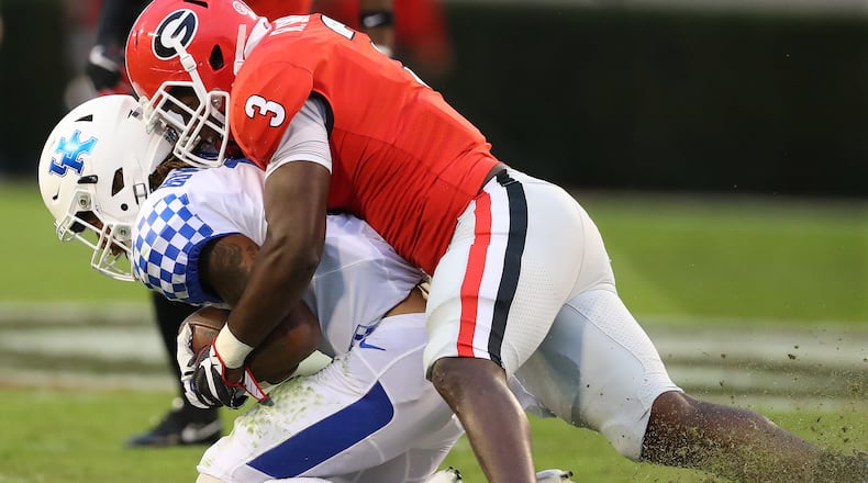 November 18, 2017 Athens: Georgia linebacker Roquan Smith levels Kentucky wide receiver Lynn Bowden, Jr., during the first half in a NCAA college football game on Saturday, November 18, 2017, in Athens. Curtis Compton/ccompton@ajc.com
