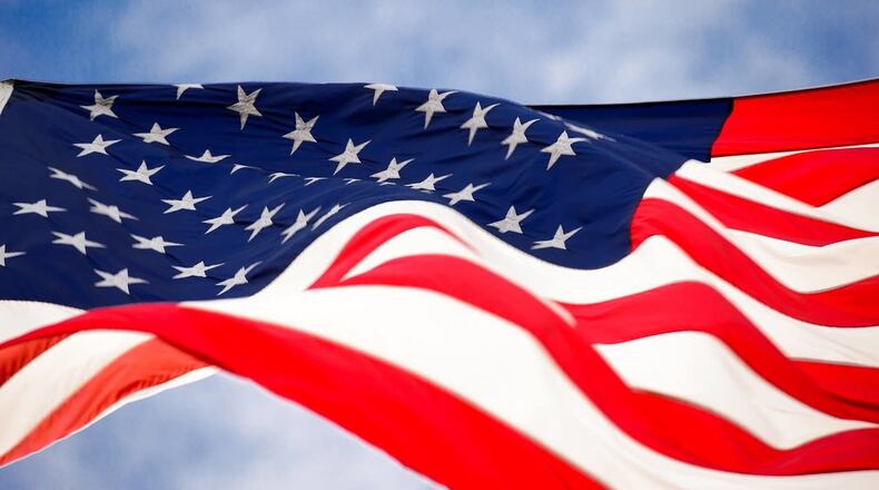 A Pennsylvania community is honoring veterans by shining its green cross for Veterans Day weekend.