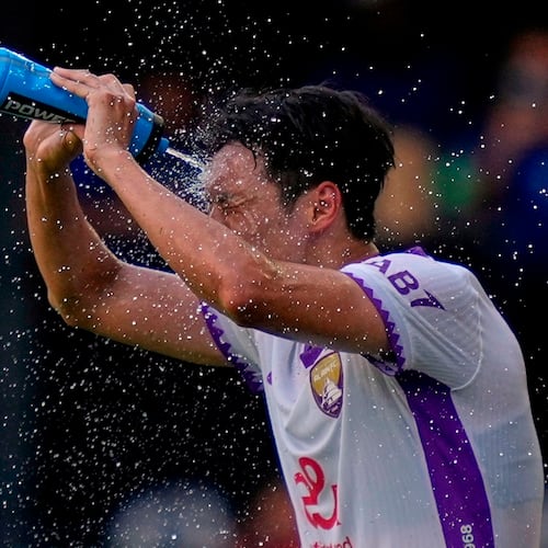 FILE - Al Ain's Park Yong-woo cools off during the Club World Cup Group G soccer match between Wydad AC and Al Ain FC in Washington, June 26, 2025. (AP Photo/Julia Demaree Nikhinson, File)