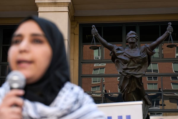 Mapheze Saleh, wife of arrested and detained Georgetown University scholar Badar Khan Suri, speaks at a news conference following her husband's hearing at Federal District Court for the Eastern District of Virginia, in Alexandria, Va., Thursday, May 1, 2025. (AP Photo/Jacquelyn Martin)