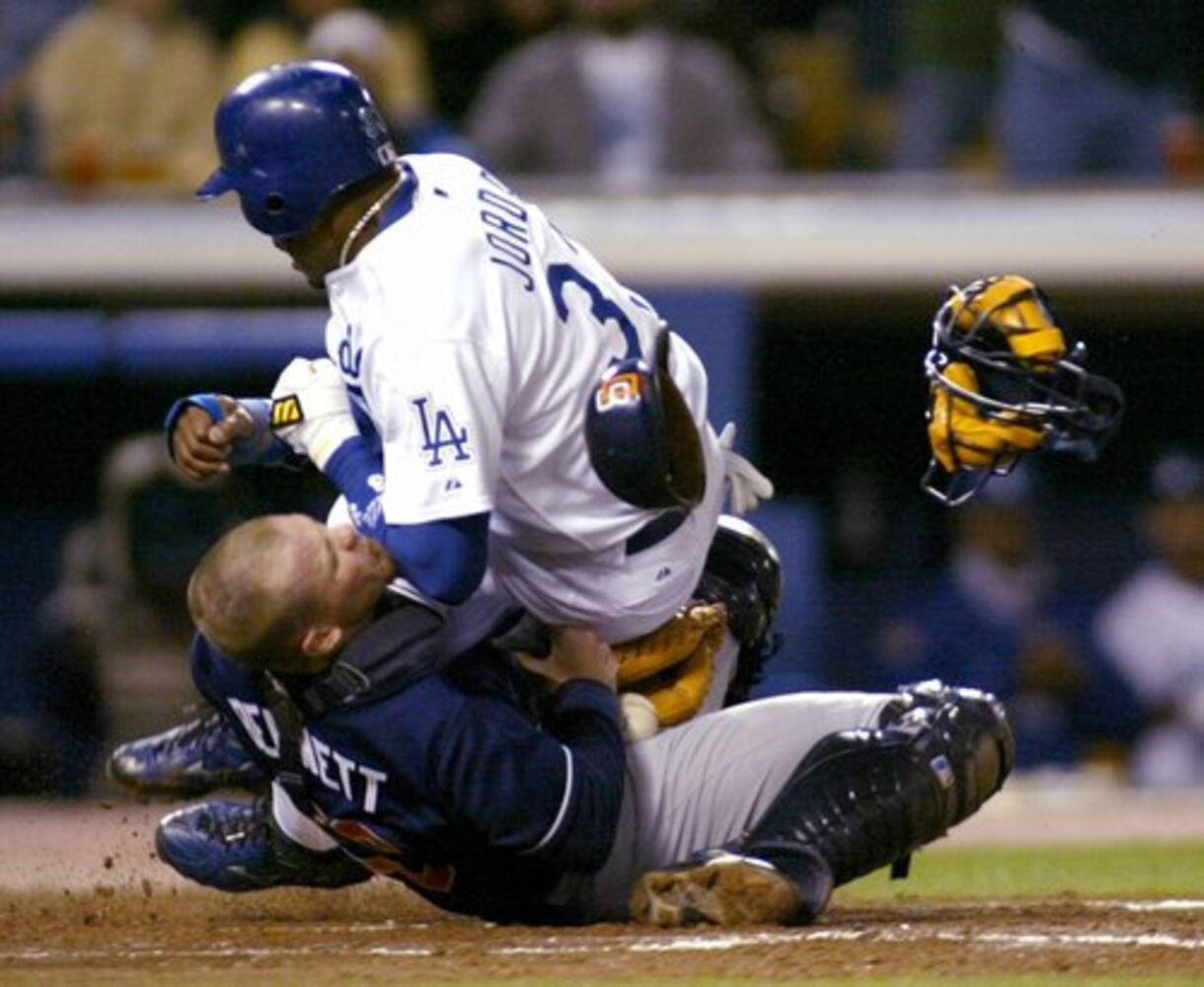 Catchers injured in home-plate collisions