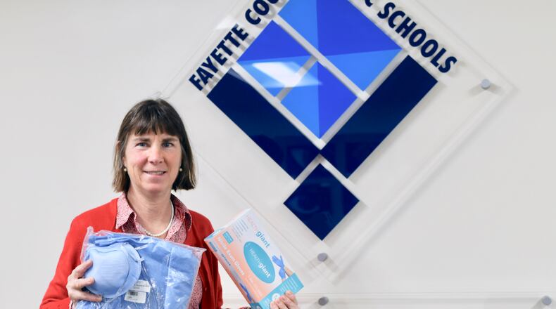 Debbie King, health services coordinator for Fayette County Public Schools, collected medical supplies from school clinics for donation to Piedmont Fayette Hospital. Courtesy FCPS