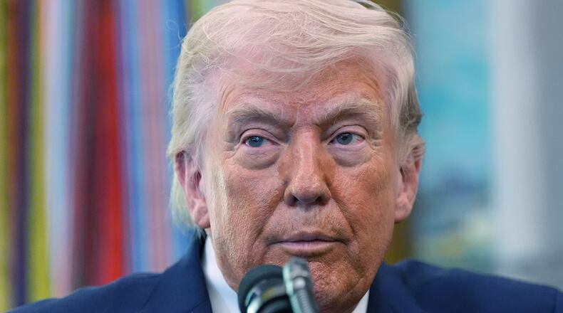 President Donald Trump speaks during the swearing in for Homeland Security Secretary Markwayne Mullin in the Oval Office of the White House, Tuesday, March 24, 2026, in Washington. (AP Photo/Alex Brandon)