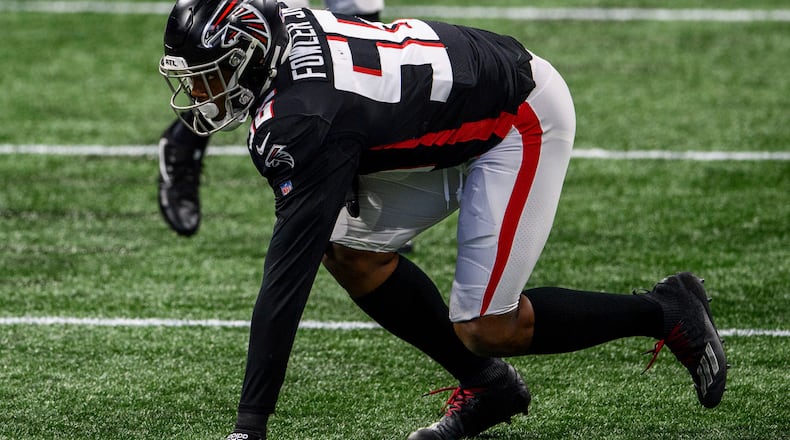 Falcons defensive end Dante Fowler (56) lines up against the Tampa Bay Buccaneers, Sunday, Dec. 20, 2020, at Mercedes-Benz Stadium in Atlanta. Tampa Bay won 31-27. (Danny Karnik/AP)