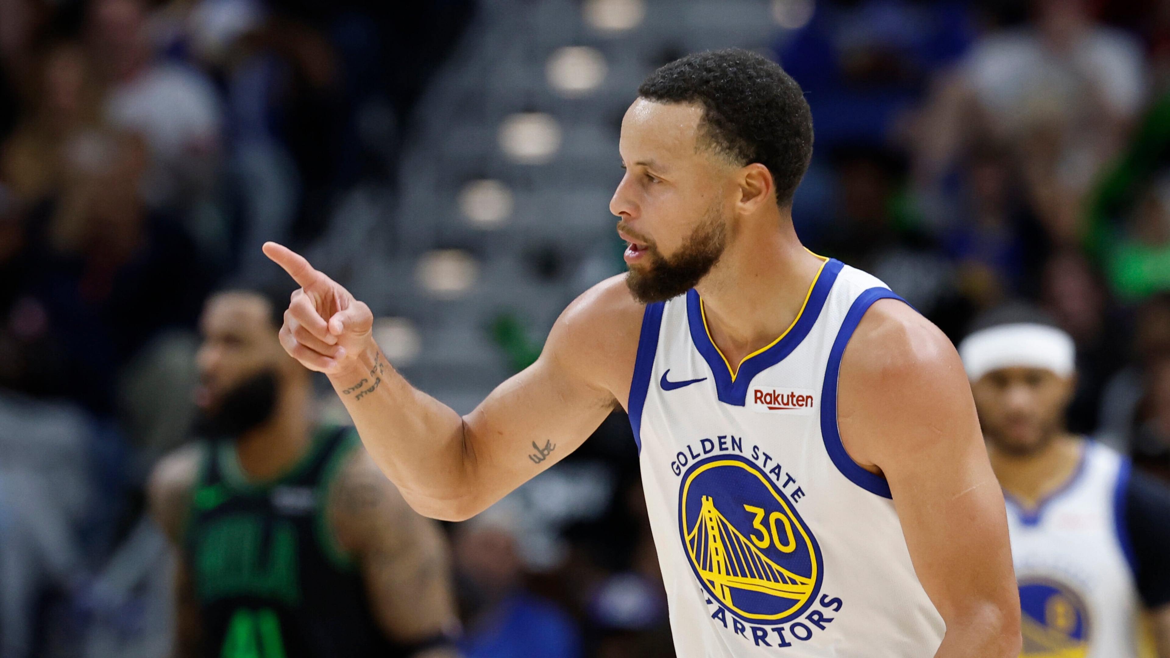 Golden State Warriors guard Stephen Curry reacts to a three-point basket against the New Orleans Pelicans during the third quarter of an NBA basketball game, Sunday, Nov. 16, 2025, in New Orleans. (AP Photo/Butch Dill)