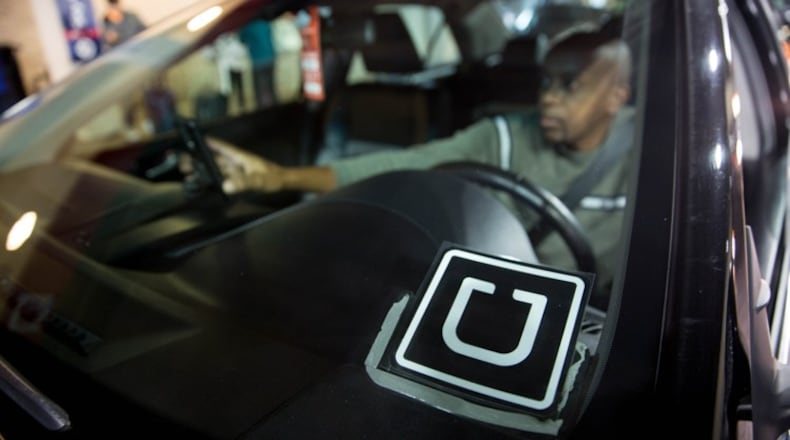 Ride-hailing companies like Uber and Lyft pay no sales taxes on Georgia. A dispute before the Georgia Tax Tribunal could change that.