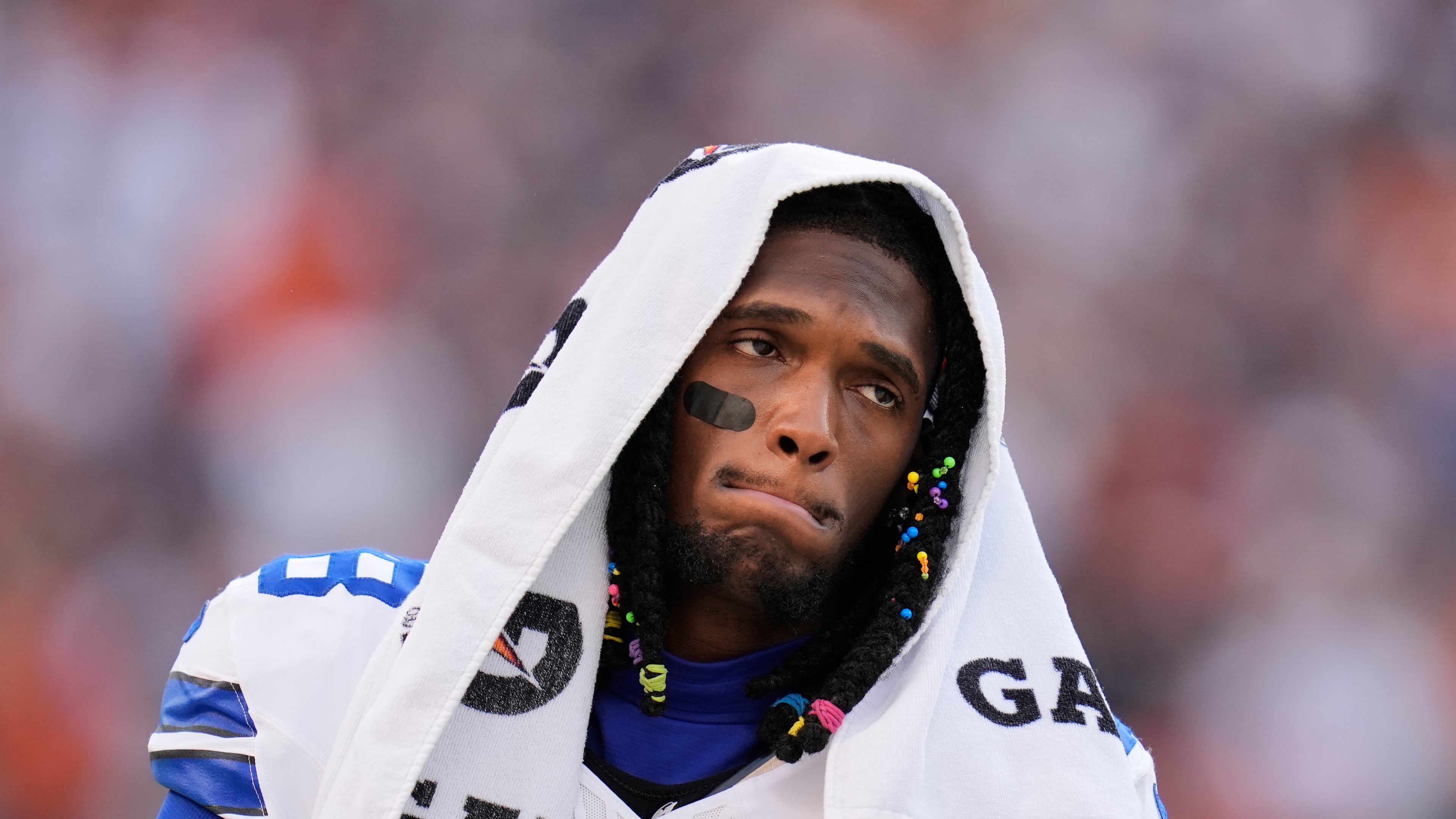 Dallas Cowboys wide receiver CeeDee Lamb walks along the sideline in the second half of an NFL football game against the Chicago Bears Sunday, Sept. 21, 2025, in Chicago. (AP Photo/Erin Hooley)