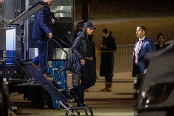 United States Director of National Intelligence Tulsi Gabbard (center) appears at Fulton County Election Hub and Operation Center in Union City on Wednesday, Jan. 28, 2026, as the FBI conducts a raid related to the 2020 election. (Arvin Temkar/AJC)