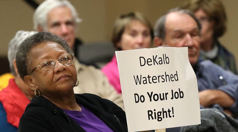 DeKalb County resident Arelia Wimby was on hand with dozens of other area residents to demand answers about excessively high water bills during a town hall meeting at the Maloof Auditorium in Decatur on Nov. 10, 2016. Curtis Compton/ccompton@ajc.com