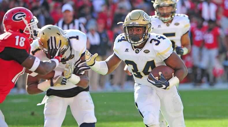 Marcus Marshall #34 of the Georgia Tech Yellow Jackets carries the ball against the Georgia Bulldogs at Sanford Stadium on November 26, 2016 in Athens, Georgia. (Photo by Scott Cunningham/Getty Images)