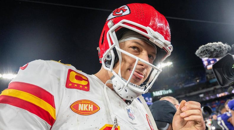 Kansas City Chiefs quarterback Patrick Mahomes (15) sticks his tongue out while walking on the field after defeating the Baltimore Ravens 17-10 in the AFC Championship Game at M&T Bank Stadium on Sunday, Jan. 28, 2024, in Baltimore. (Emily Curiel/The Kansas City Star/TNS)