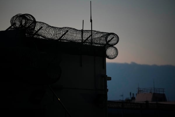 FILE -Exterior view of Shek Pik Prison is seen in Hong Kong, Jan. 19, 2022. (AP Photo/Kin Cheung, File)