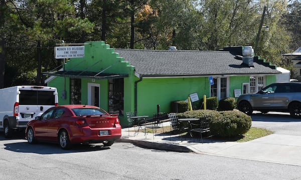 Dexter Weaver has listed his restaurant for sale, expecting that whoever buys the building will use the quarter-acre lot for something else. The area, just down the hill from Athens' downtown, has filled in over the last decade with high-rise apartments, renovated rental houses and parking decks. (Hyosub Shin/AJC)