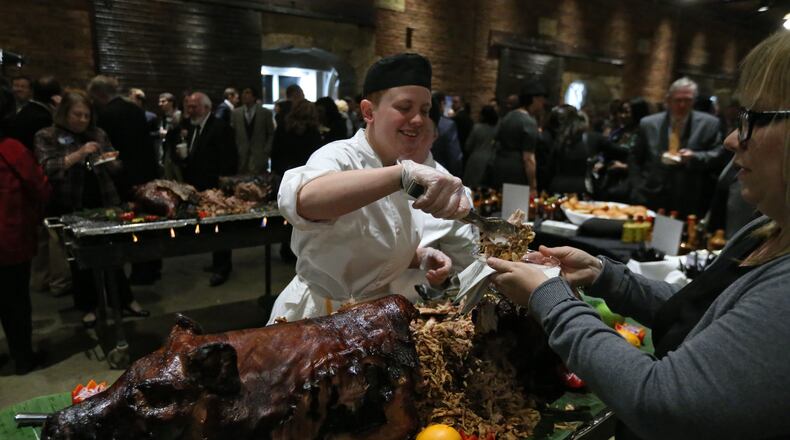 Jan. 10, 2016 - Atlanta - Flo Young, from Conyers, was one of the servers at the 54th annual Wild Hog Supper, which benefits the Georgia Food Bank Association. BOB ANDRES / BANDRES@AJC.COM
