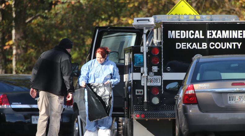 Police are investigating the discovery of a body Tuesday morning in south DeKalb County. JOHN SPINK/JSPINK@AJC.COM