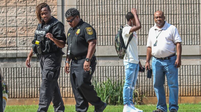 Aug 13, 2019 DeKalb County : Officers burst into classrooms with guns drawn Tuesday morning, August 13, 2019 after a Stephenson High School student reported seeing an armed classmate. The gun scare prompted a heavy police presence, road closures and a Level 3 lockdown at the school on Stephenson Road in Stone Mountain. According to DeKalb County School District police Chief Bradley Gober, a female student told officials she noticed a classmate get on and off a school bus with a gun. A sweep of the campus came up empty and there was no student found with a weapon, he said. Students were eventually allowed to reenter the building, and blocked roads were reopened about 10:30 a.m. The lack of information from district officials, however, sent panicked parents to Stephenson to check on their children. JOHN SPINK/JSPINK@AJC.COM