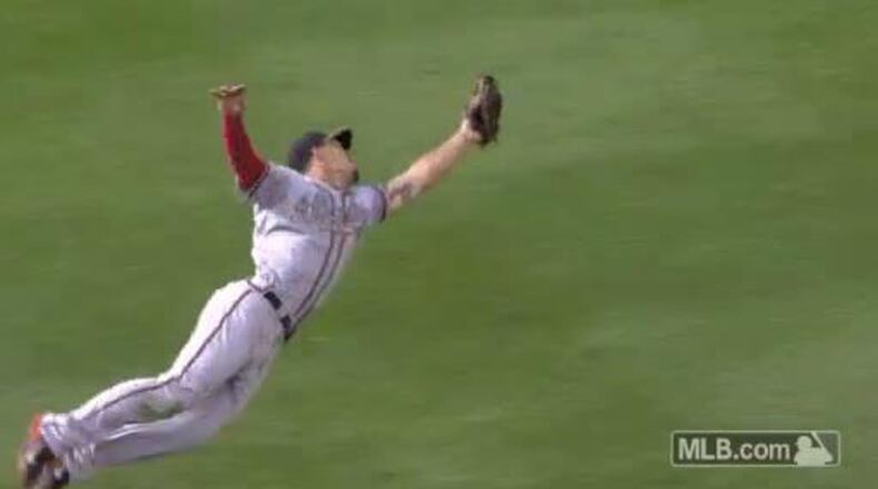Braves second baseball Jace Peterson stretches out to make a play in the fourth inning of a 6-3 loss to the Dodgers in Los Angeles.