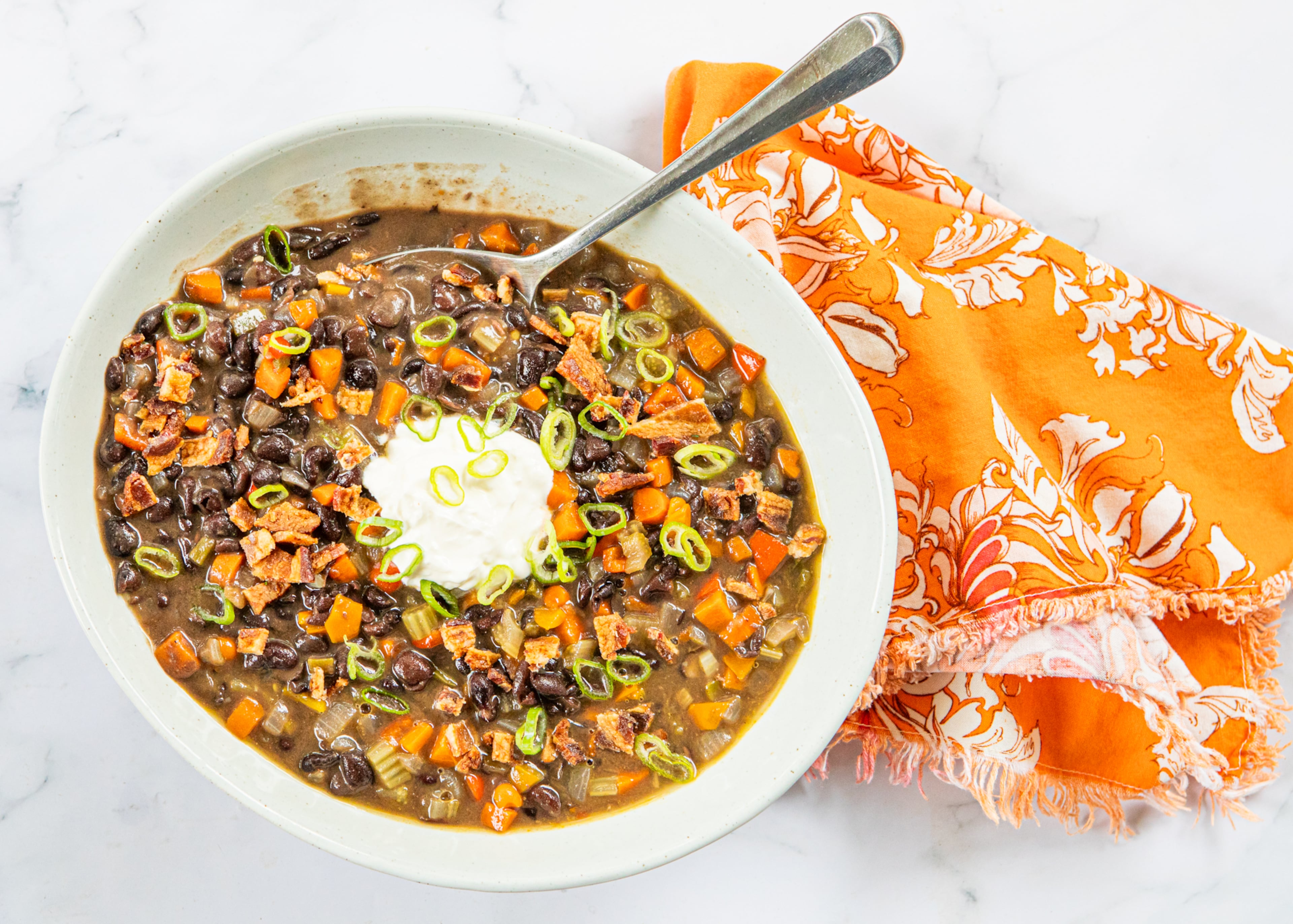 The ingredients in this Black Bean Soup can be adjusted according to both your taste preferences and your pantry contents. (Aaliyah Man for the AJC/food styling by Kate Williams)