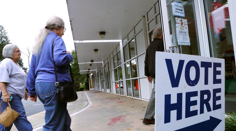 Precinct workers were pleased with the turnout at In Hawthorne Elementary, with 275 voters by 11am. DeKalb County residents could vote on an ethics overhaul for the county and city hood for LaVista Hills and Tucker. BOB ANDRES / BANDRES@AJC.COM