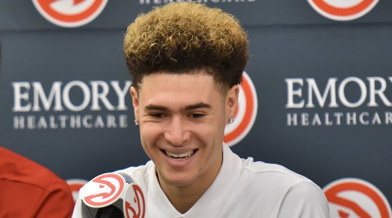 June 28, 2016 Atlanta - DeAndre' Bembry (left) and Isaia Cordinier react during a press conference on Tuesday, June 28, 2016. The Hawks selected St. Joseph's University forward DeAndre' Bembry with the 21th overall pick in the first round and Isaia Cordinier in the second round (44th overall) of the 2016 NBA Draft. HYOSUB SHIN / HSHIN@AJC.COM