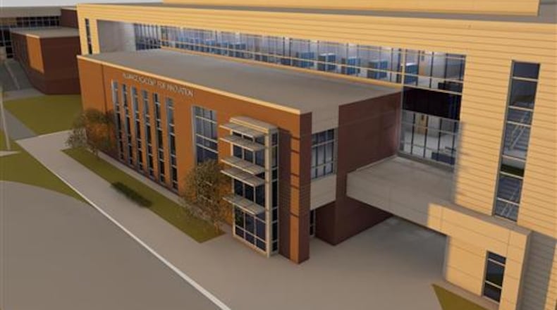 An artist rendering of the new Alliance Academy for the Arts high school, opening in August of 2018. The Cumming City Council has approved a new traffic light nearby on Lanier 400 Parkway to help mitigate an anticipated jump in traffic.