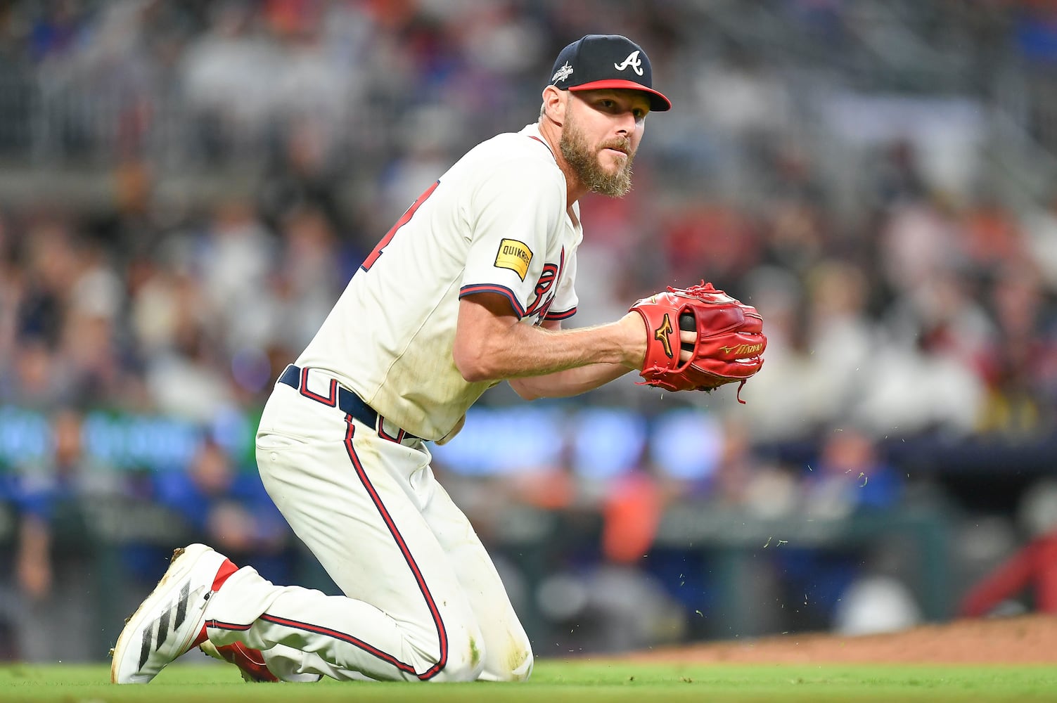 Atlanta Braves pitcher Chris Sale (51) fields a ground ball throwing Mets outfielder Juan Soto (22) out at first during the ninth inning of a MLB game Wednesday, June 18, 2025 at Truist Park. (Daniel Varnado/For the Atlanta Journal-Constitution)