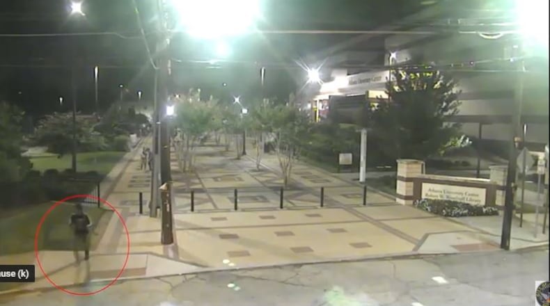 Atlanta police are still searching for a second suspect, shown in this still from a surveillance video, wanted in connection with a shooting on the Atlanta University Center campus.