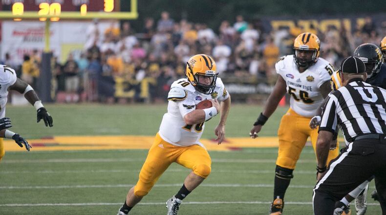 Kennesaw State’s Trey White runs through an opening. Photo by Collin Brooks