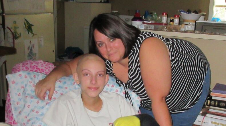 Cristy Rice of Waycross with her daughter Lexi Crawford. Lexi was diagnosed in June 2015 with a rare form of cancer, rhabdomyosarcoma. (Photo: Andy Miller / GeorgiaHealthNews.com)
