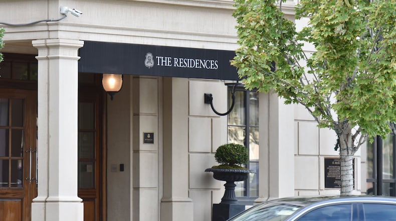 Christopher Brogdon owns a condo at St. Regis Hotel & Residences Atlanta in Buckhead, but he is under pressure to sell it to help pay investors deceived in deals involving senior care facilities. HYOSUB SHIN / HSHIN@AJC.COM