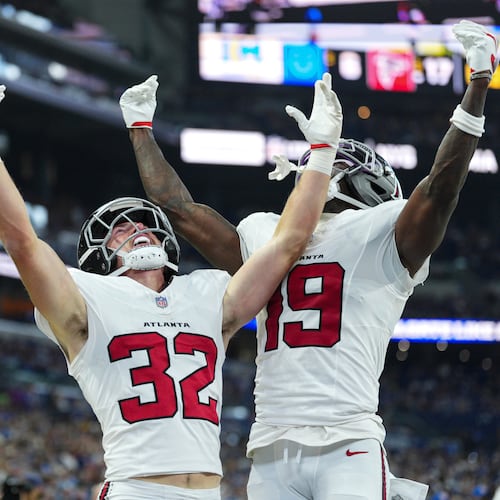 Atlanta Falcons running back Cash Jones (32) celebtes his touchdown with wide receiver Chris Blair (19) against the Indianapolis Colts during the first half of an NFL football game in Indianapolis, Saturday, Aug. 22, 2026. (AP Photo/AJ Mast)