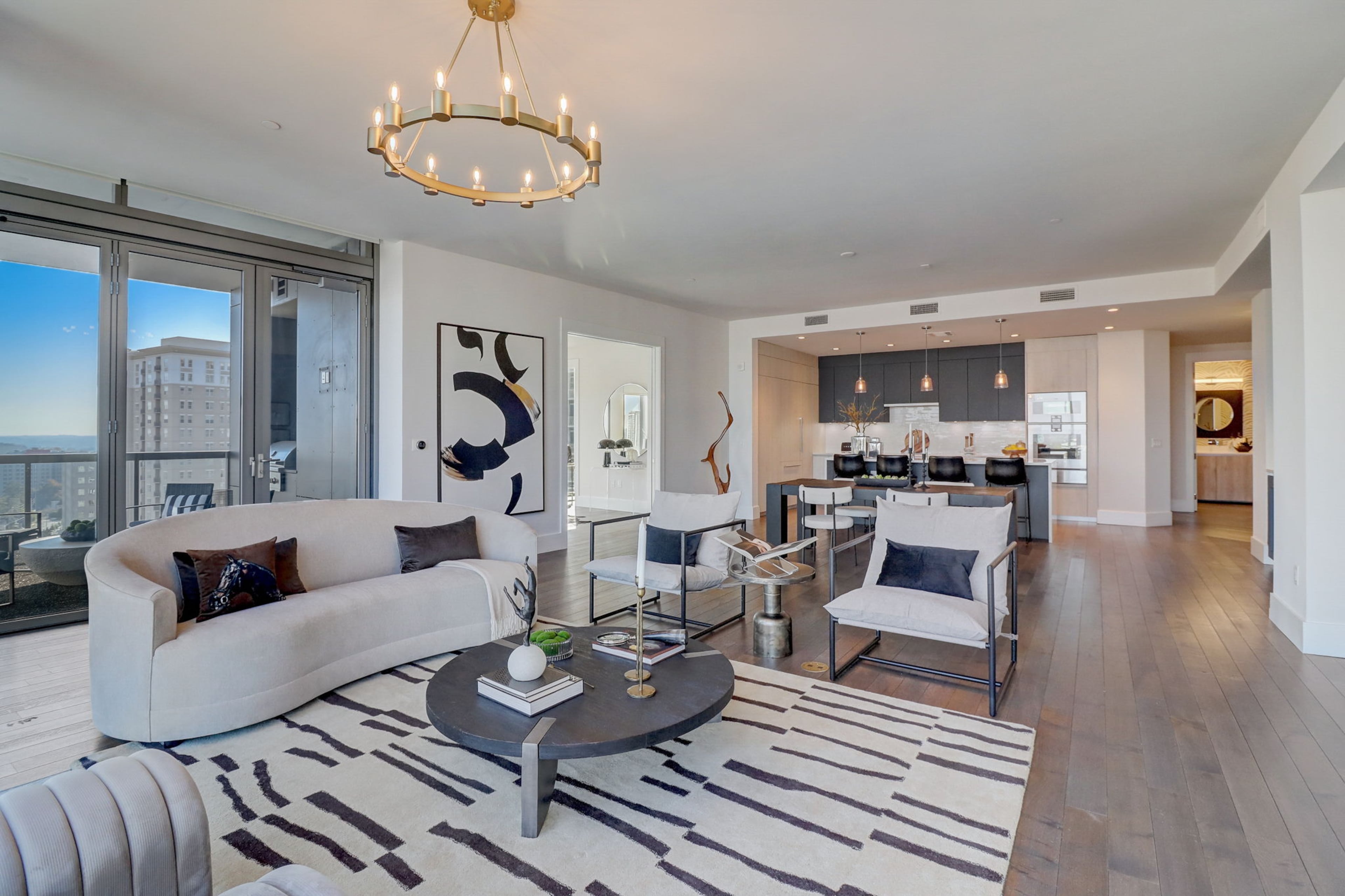 Represented by Compass realtor Ericka Mitchell (ericka.mitchell@compass.com), Former Atlanta Hawks power forward John Collins’ Atlanta condo is stunning. Photos courtesy of ShowingTimePlus