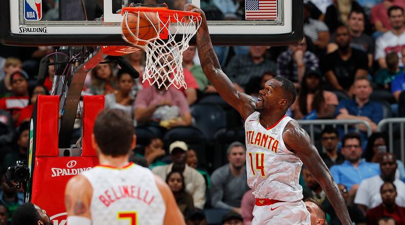 Dewayne Dedmon of the Atlanta Hawks dunks against the Boston Celtics at Philips Arena on November 6, 2017 in Atlanta, Georgia. (Photo by Kevin C. Cox/Getty Images)