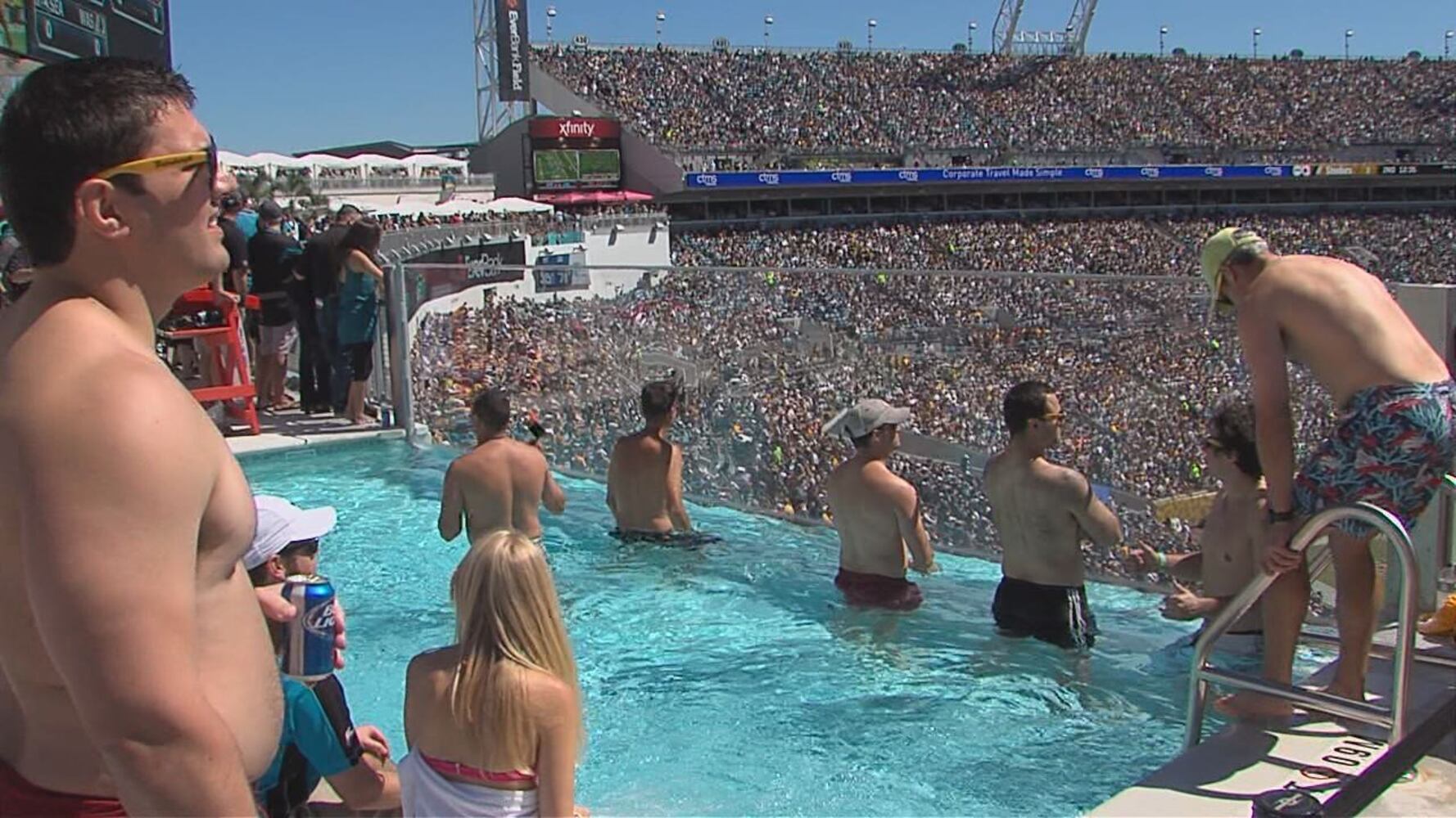 Watching the Jaguars game from the pool deck
