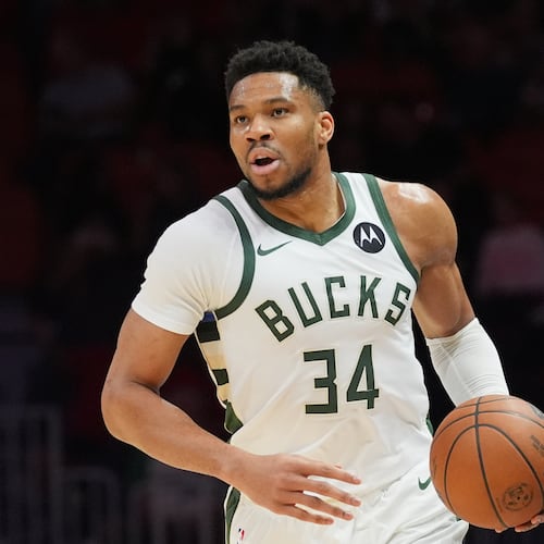 FILE - Milwaukee Bucks forward Giannis Antetokounmpo (34) dribbles the ball during the first half of an NBA basketball game against the Miami Heat, March 12, 2026, in Miami. (AP Photo/Marta Lavandier, File)