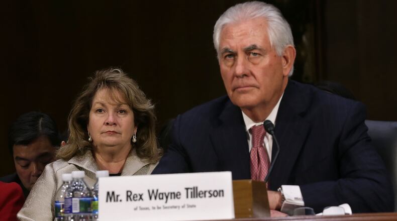 WASHINGTON, DC - JANUARY 11: Renda Tillerson (L) listens during the confirmation hearing for her husband and former ExxonMobil CEO Rex Tillerson (R), U.S. President-elect Donald Trump's nominee for Secretary of State, before Senate Foreign Relations Committee January 11, 2017 on Capitol Hill in Washington, DC. Tillerson is expected to face tough questions regarding his ties with Russian President Vladimir Putin. (Photo by Alex Wong/Getty Images)