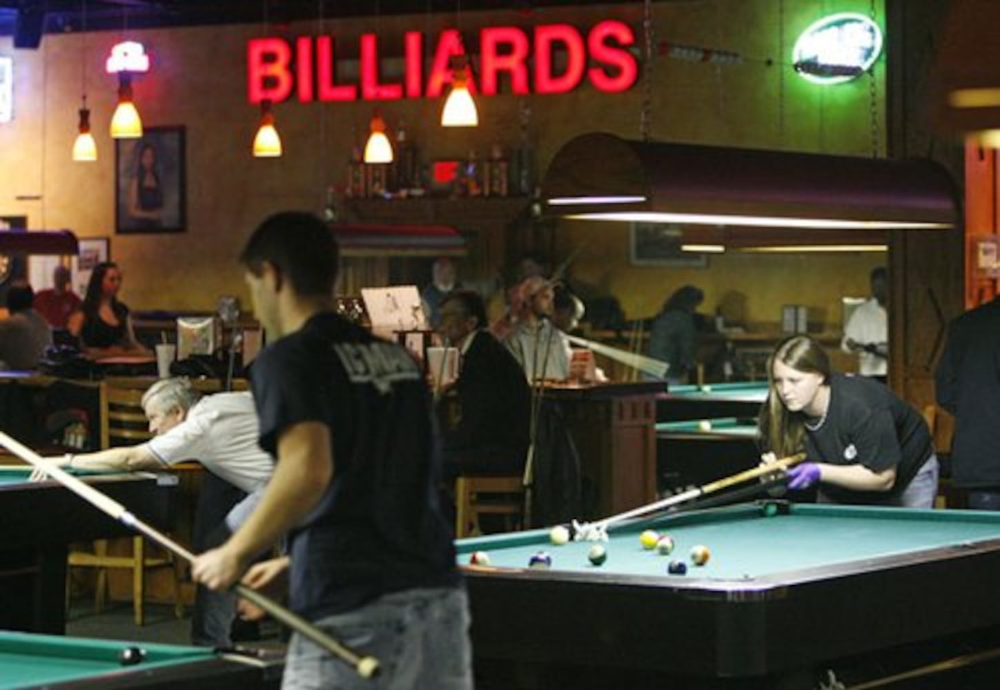 Pool hall offers solace in tough times