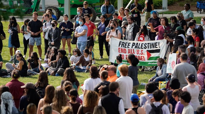Emory University community members gather on the campus quad for a rally in support of Palestinians on Friday, April 26, 2024. The quad typically is the site of commencement, but this year's events will occur off campus, with university leaders citing safety concerns and advice from law enforcement and security experts.