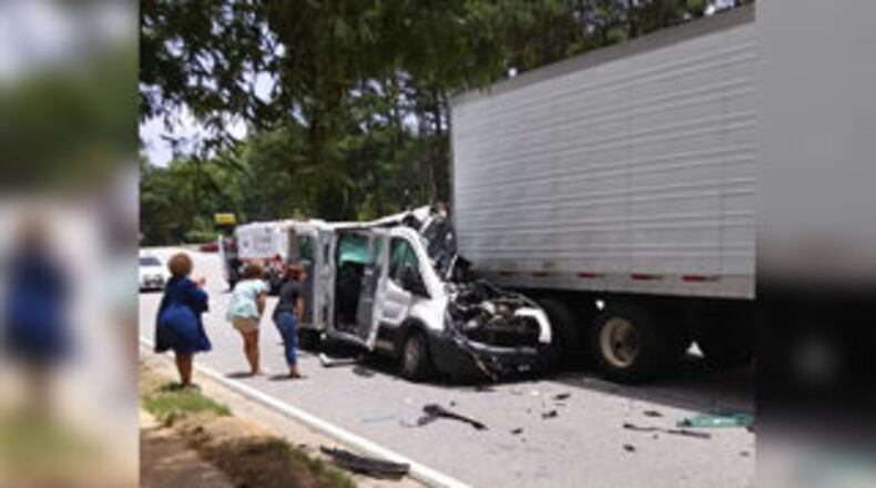 Two people were killed Monday afternoon when a van collided with a tractor-trailer in Union City.