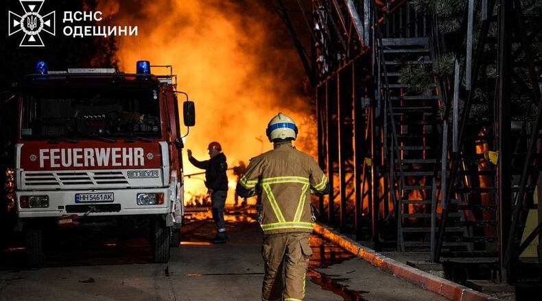 Ukrainian emergency crew responds to a fire in Ukraine's southern Odesa region after Russian attack overnight on Sunday, May 3, 2026. (Ukrainian Emergency Service via AP)