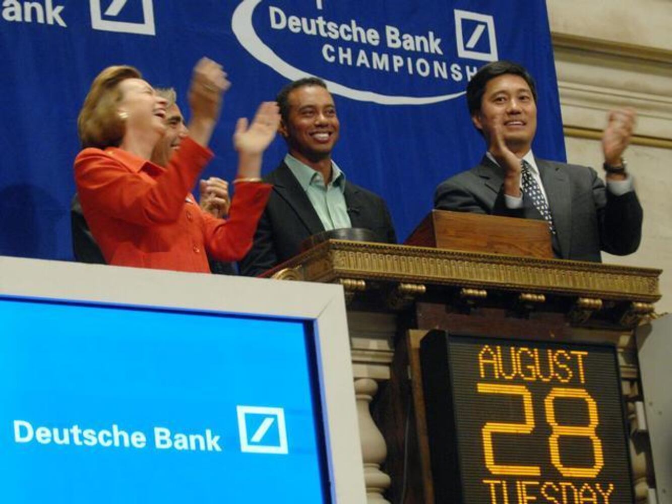 Tiger Woods rings the opening bell at the New York Stock Exchange in August of 2007.