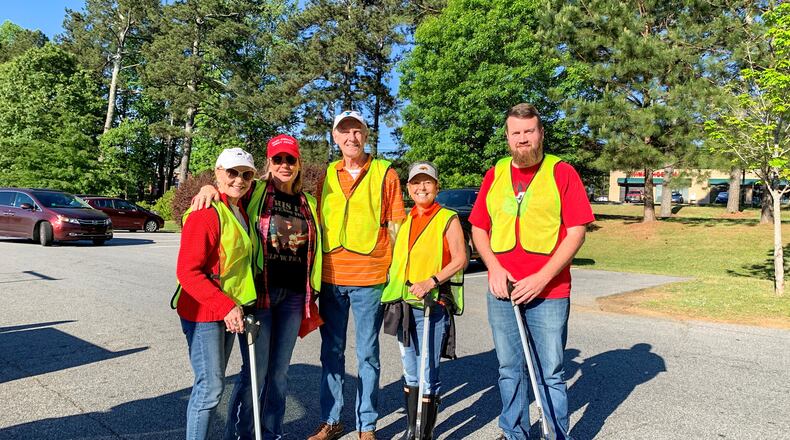 Keep Cherokee Beautiful's first cleanup took place May 1st. Among the 26 community volunteers were Kat Shell; Vanessa Malone; Benny Carter, County Commissioner; Charlice Byrd, State Representative; and Jordan Ridley (L-R).