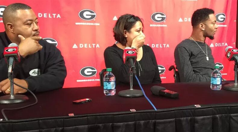 Donny, Tanisha and Devon Gales react to the news Wednesday that the Triumph over Tragedy Foundation is raising money to build them a new handicap-accessible home in Baton Rouge.