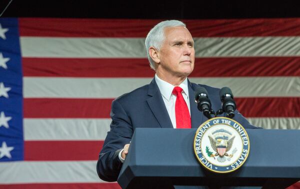Vice President Mike Pence speaks to supporters at Rock Springs Church for a rally for Rep. Senators Loeffler and Perdue in Milner, GA stumping for votes Monday, January 4, 2021, a day before the runoff election.  (Jenni Girtman for The Atlanta Journal-Constitution)