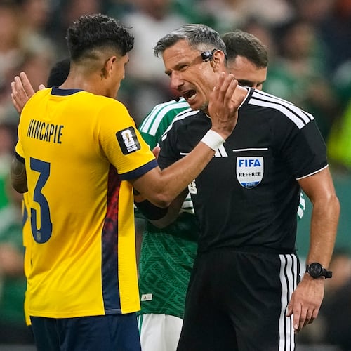 Referee Slavko Vincic of Slovenia speaks to Ecuador's Piero Hincapie (3) before sending him from the field during the World Cup round of 32 soccer match between Mexico and Ecuador in Mexico City, Tuesday, June 30, 2026. (AP Photo/Natacha Pisarenko)