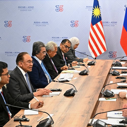 Russian President Vladimir Putin, fourth right, and Malaysian Prime Minister Anwar Ibrahim, second left, attend a talks on the sidelines of the Russia-ASEAN summit in Kazan, Russia, Wednesday, June 17, 2026. (Sergei Bobylev/Sputnik, Kremlin Pool Photo via AP)