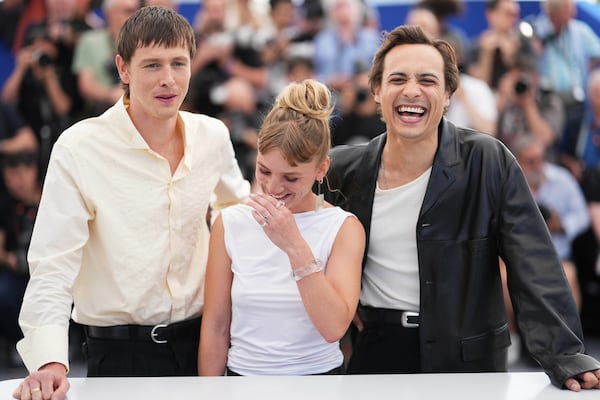 Director Harris Dickinson, from left, Megan Northam and Frank Dillane pose for photographers at the photo call for the film 'Urchin' at the 78th international film festival, Cannes, southern France, Saturday, May 17, 2025. (Photo by Lewis Joly/Invision/AP)